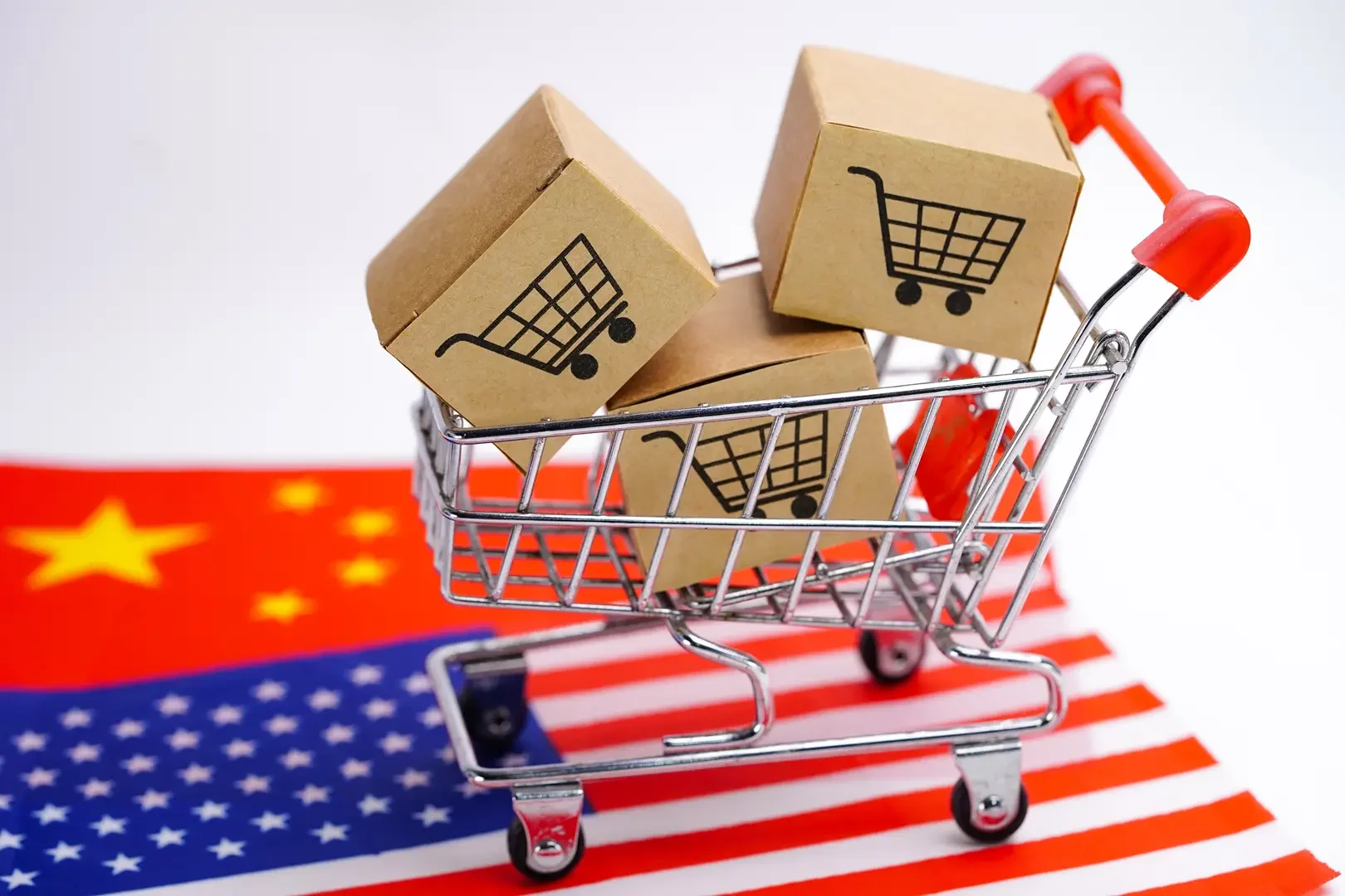 Box with shopping cart logo on usa and china flag 2026 01 08 22 28 53 utc